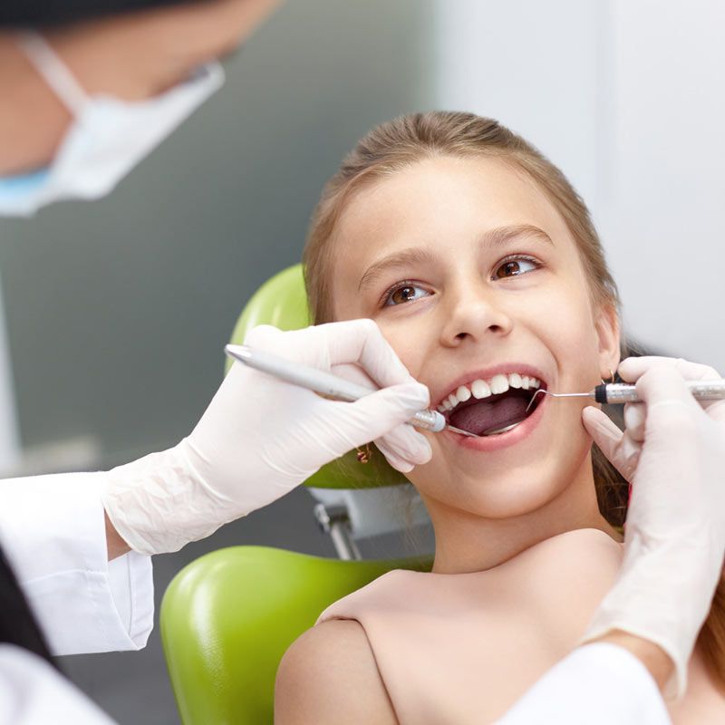 Dentist Working on Childs Teeth 2